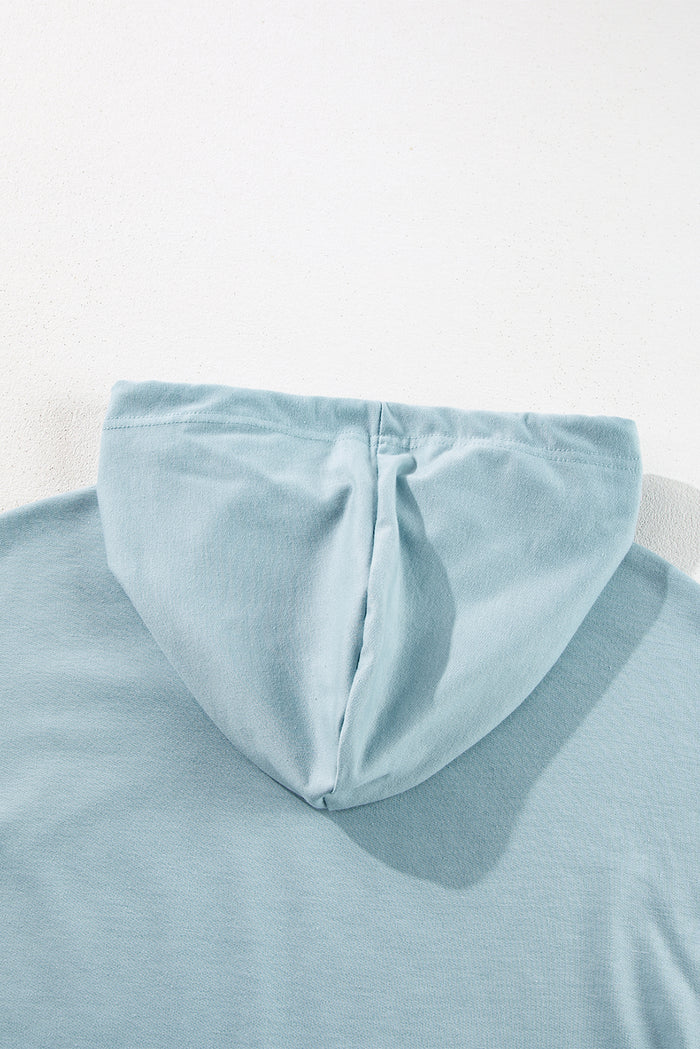 Sweat à capuche tunique coupe ample bleu islandais avec ourlet à volants uni