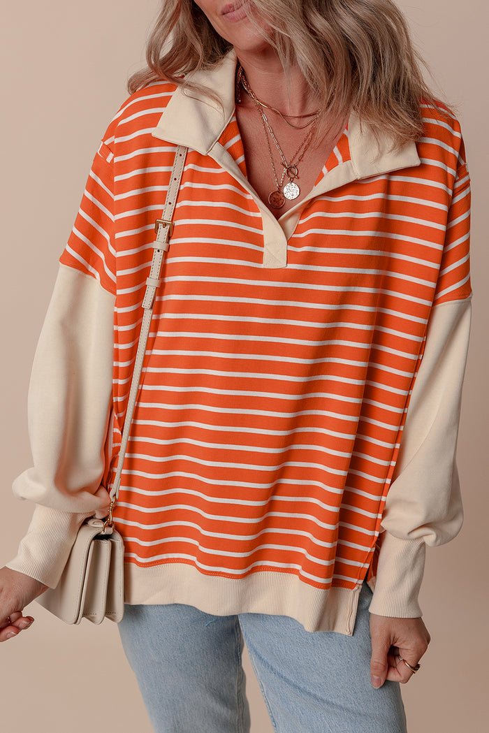 Sweat-shirt à rayures orange et blocs de couleur, coupe ample, col et épaules tombantes