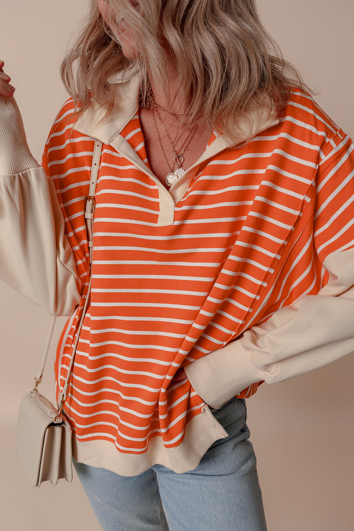 Sweat-shirt à rayures orange et blocs de couleur, coupe ample, col et épaules tombantes