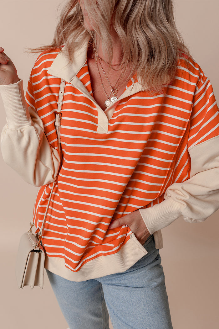 Sweat-shirt à rayures orange et blocs de couleur, coupe ample, col et épaules tombantes
