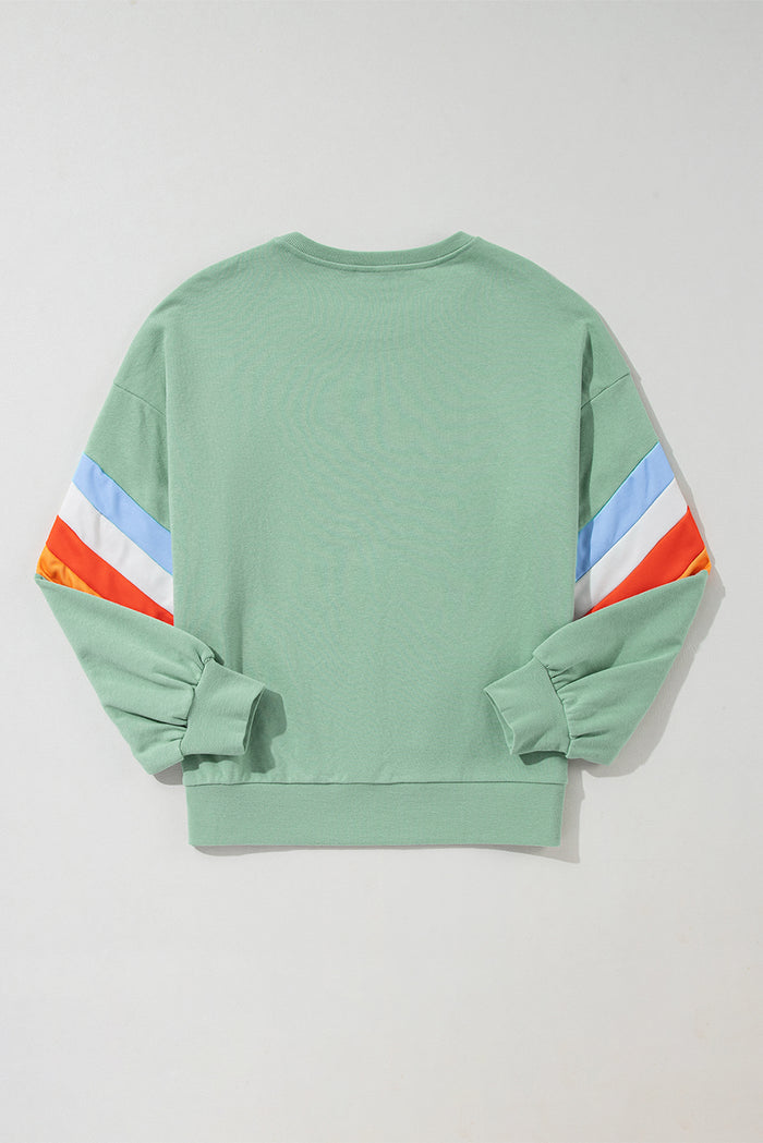 Sweat-shirt ample à manches rayées arc-en-ciel et col rond
