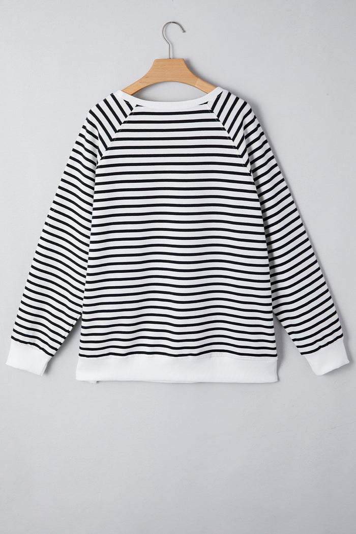 Sweat-shirt ample à rayures noires, manches raglan, fentes latérales