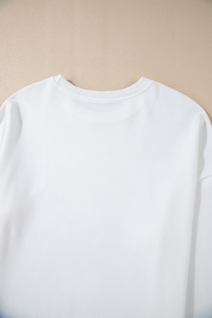 Sweat-shirt ample blanc à motif de nœud papillon et épaules tombantes
