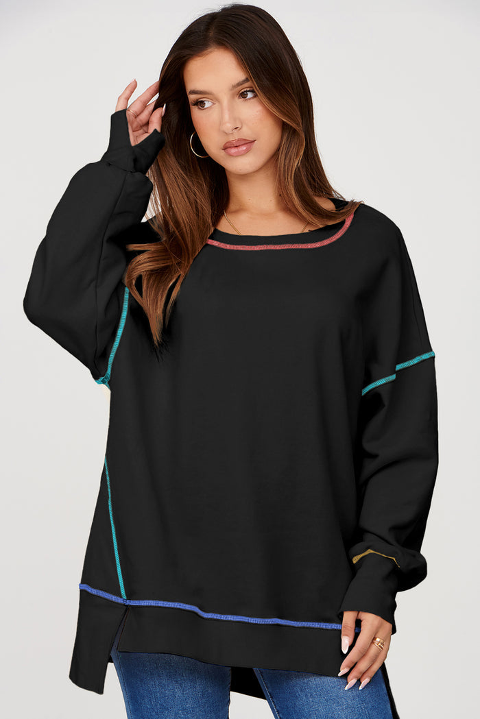 Sweat-shirt ample noir fendu à coutures contrastées