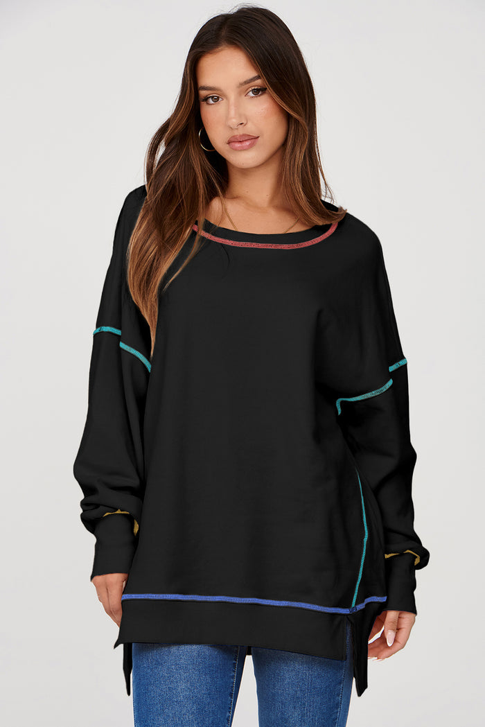 Sweat-shirt ample noir fendu à coutures contrastées