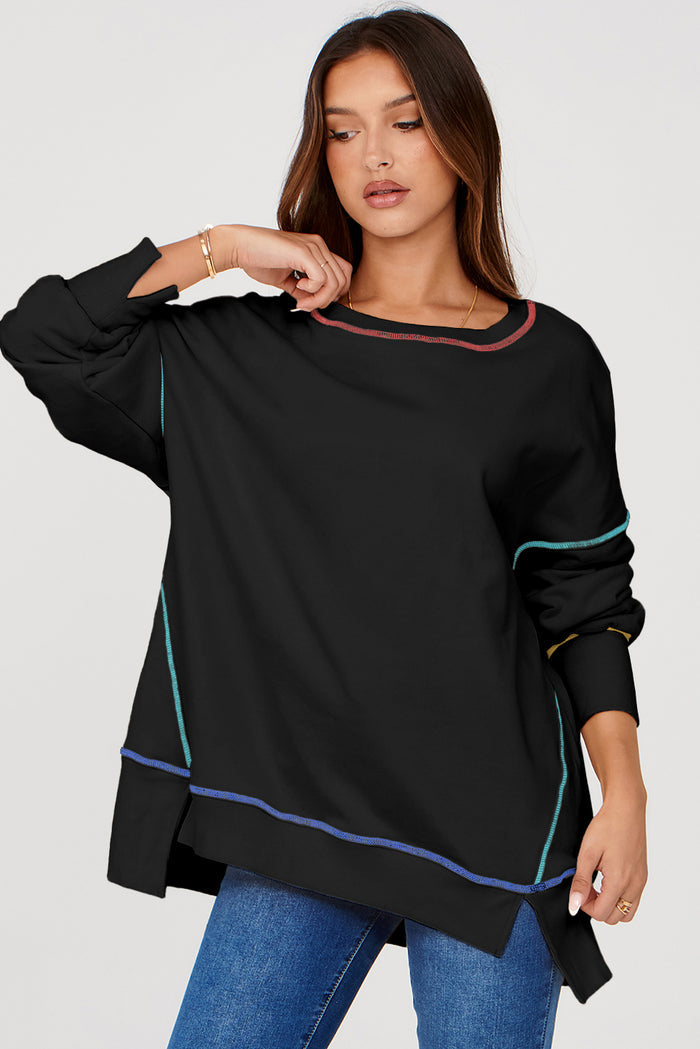 Sweat-shirt ample noir fendu à coutures contrastées