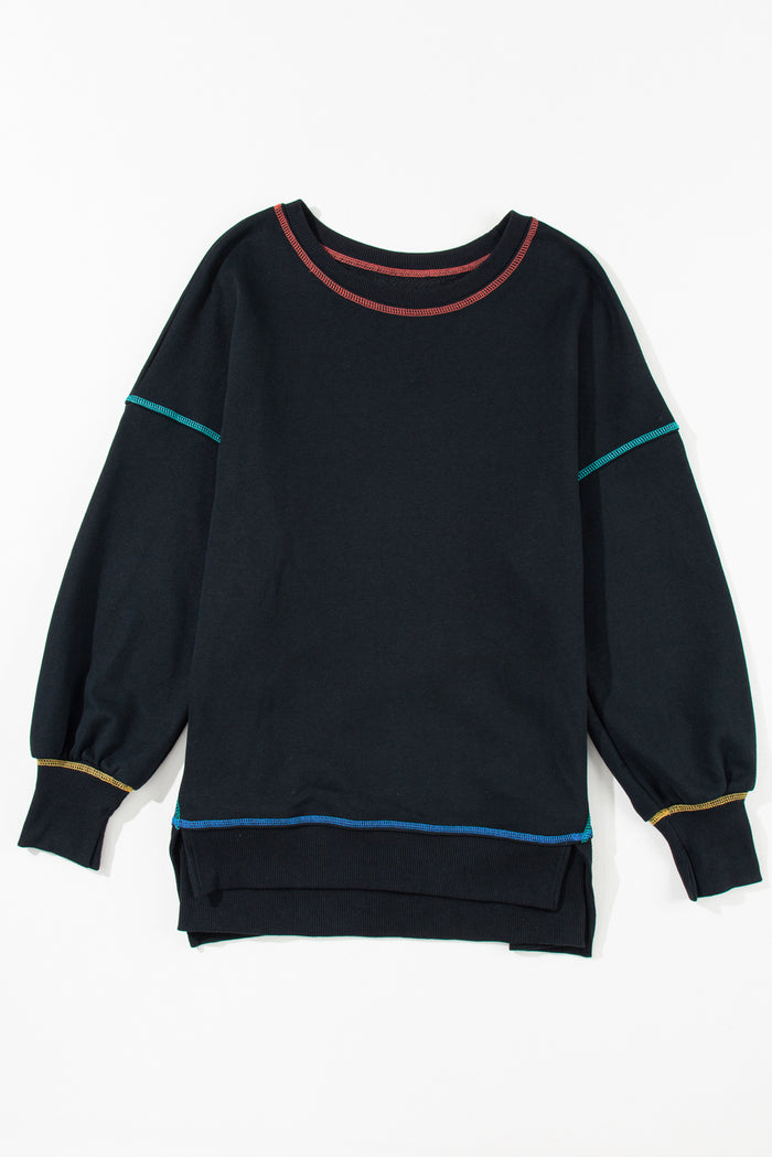 Sweat-shirt ample noir fendu à coutures contrastées