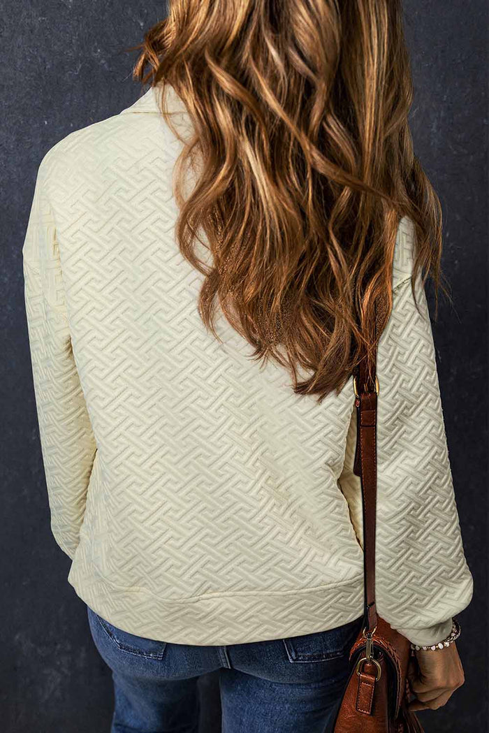 Sweat-shirt beige à col demi-fermeture éclair texturé uni