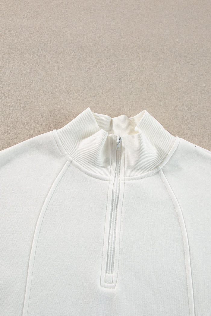 Sweat-shirt blanc à col zippé et épaules tombantes