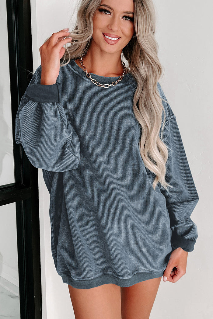 Sweat-shirt bleu uni en tricot côtelé à col rond