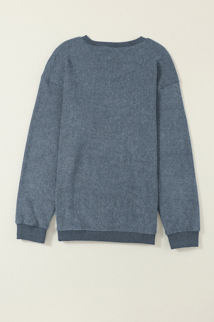 Sweat-shirt bleu uni en tricot côtelé à col rond