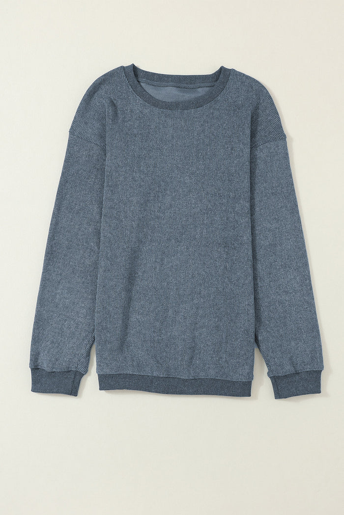 Sweat-shirt bleu uni en tricot côtelé à col rond