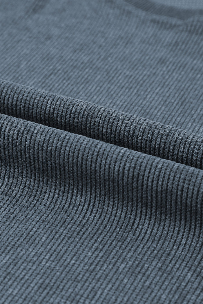 Sweat-shirt bleu uni en tricot côtelé à col rond