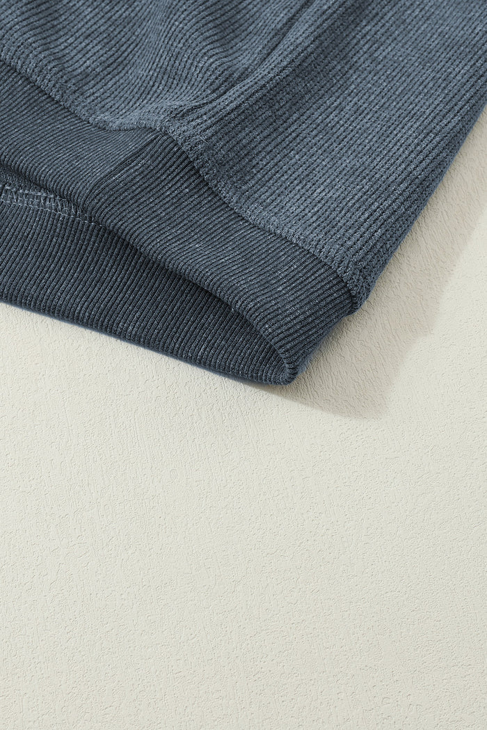 Sweat-shirt bleu uni en tricot côtelé à col rond