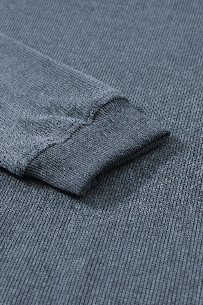 Sweat-shirt bleu uni en tricot côtelé à col rond