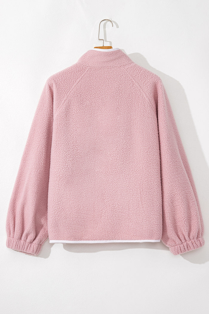 Sweat-shirt en peluche Fushia à col montant et poche zippée à demi-bouton