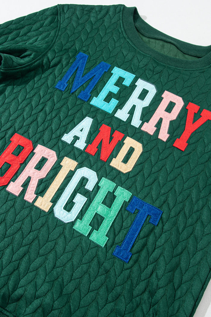 Sweat-shirt en tricot torsadé joyeux et lumineux vert noirâtre