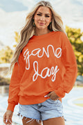 Sweat-shirt graphique à épaules tombantes et guirlandes orange russet Game Day