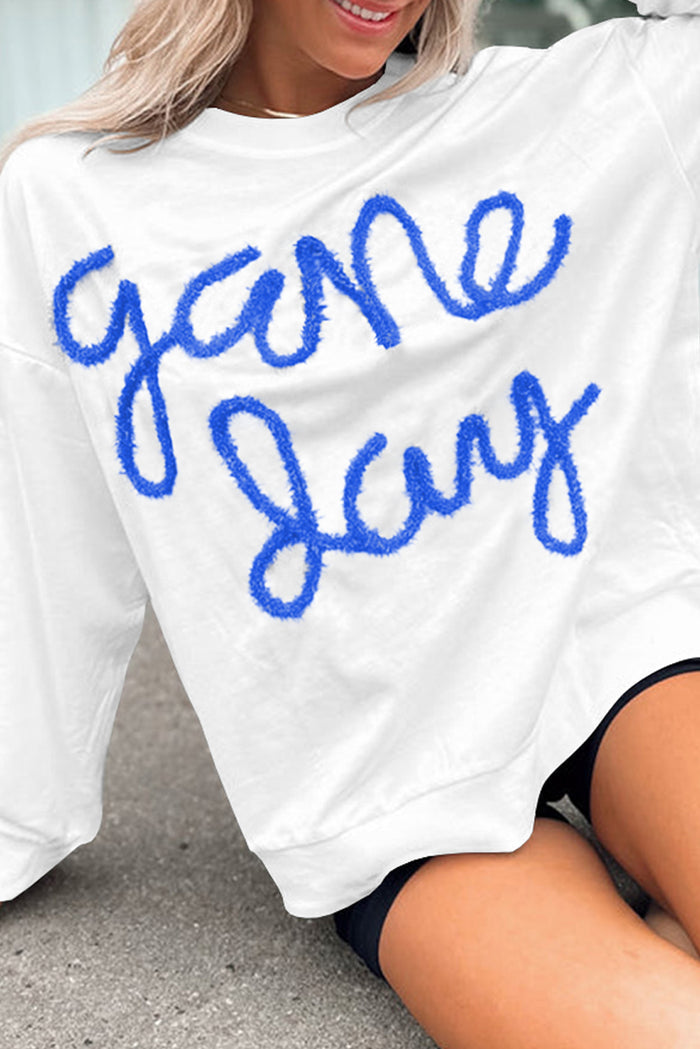 Sweat-shirt graphique blanc Tinsel Game Day à épaules tombantes