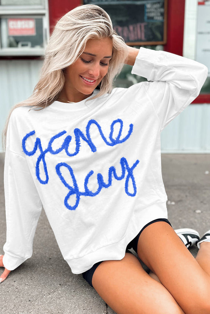Sweat-shirt graphique blanc Tinsel Game Day à épaules tombantes
