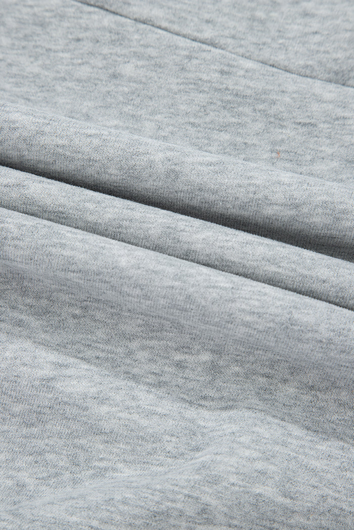 Sweat-shirt gris à demi-fermeture éclair et épaules tombantes avec fentes latérales
