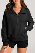 Sweat-shirt noir à col montant et poche kangourou avec fermeture éclair quart de tour
