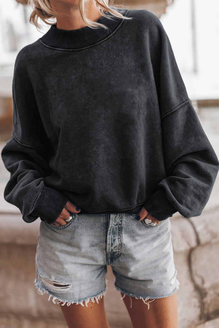 Sweat-shirt noir à col ras du cou et épaules tombantes