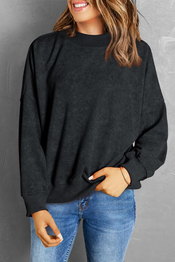 Sweat-shirt noir à col ras du cou et épaules tombantes