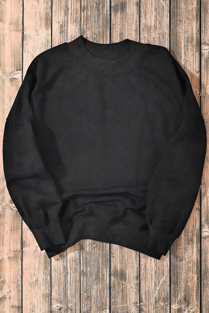 Sweat-shirt noir à col ras du cou et épaules tombantes