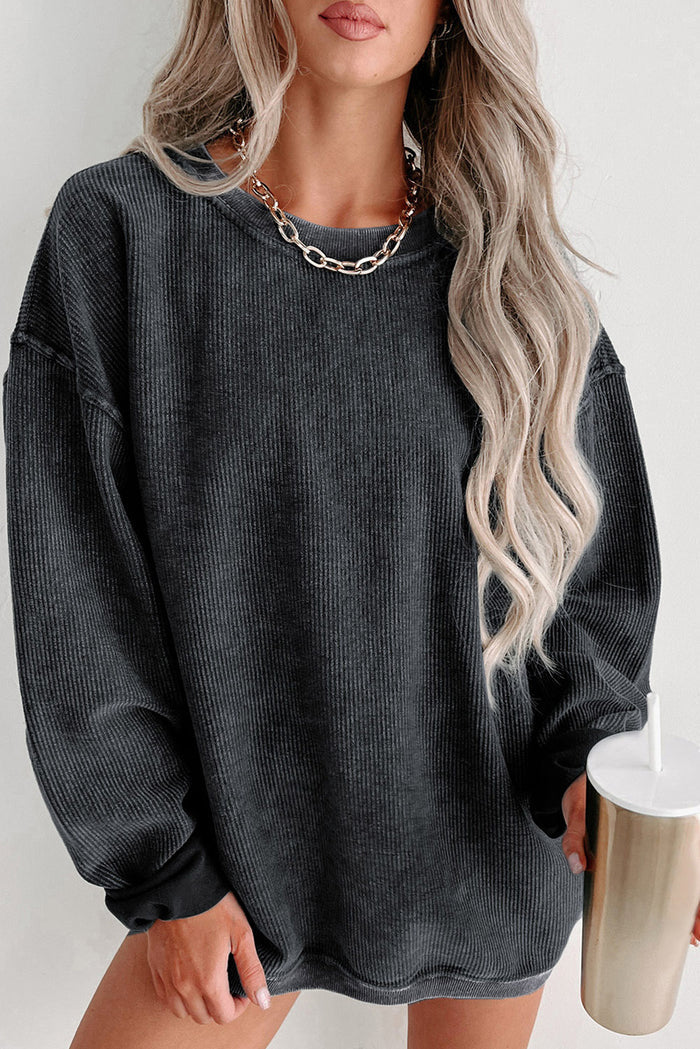 Sweat-shirt noir à col rond en tricot côtelé uni
