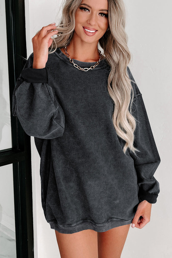 Sweat-shirt noir à col rond en tricot côtelé uni