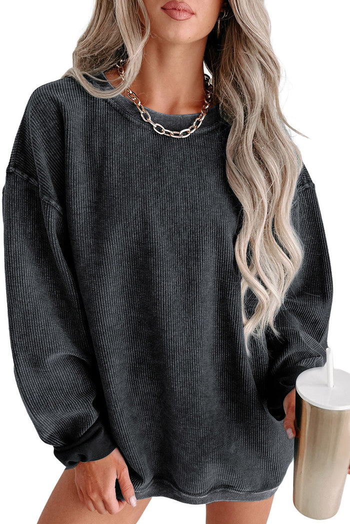 Sweat-shirt noir à col rond en tricot côtelé uni