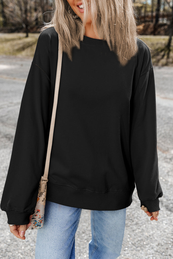 Sweat-shirt noir uni à épaules tombantes et col rond