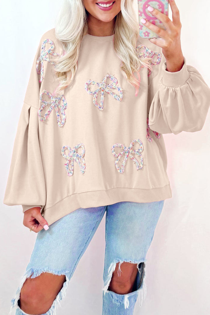Sweat-shirt oversize à manches lanterne et nœud brodé parchemin