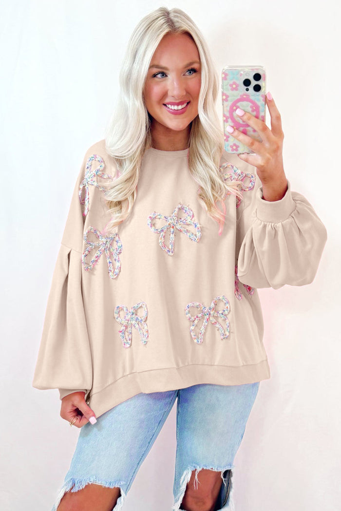 Sweat-shirt oversize à manches lanterne et nœud brodé parchemin