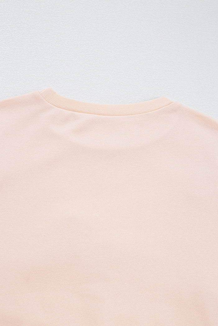 Sweat-shirt oversize à manches lanterne et nœud brodé parchemin