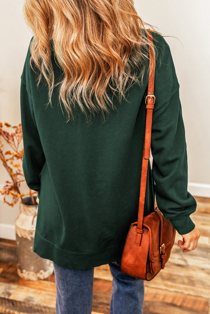 Sweat-shirt oversize vert à épaules tombantes et ourlet fendu