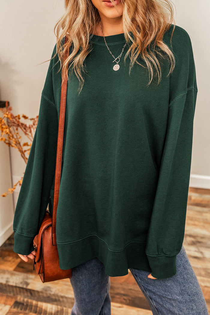 Sweat-shirt oversize vert à épaules tombantes et ourlet fendu