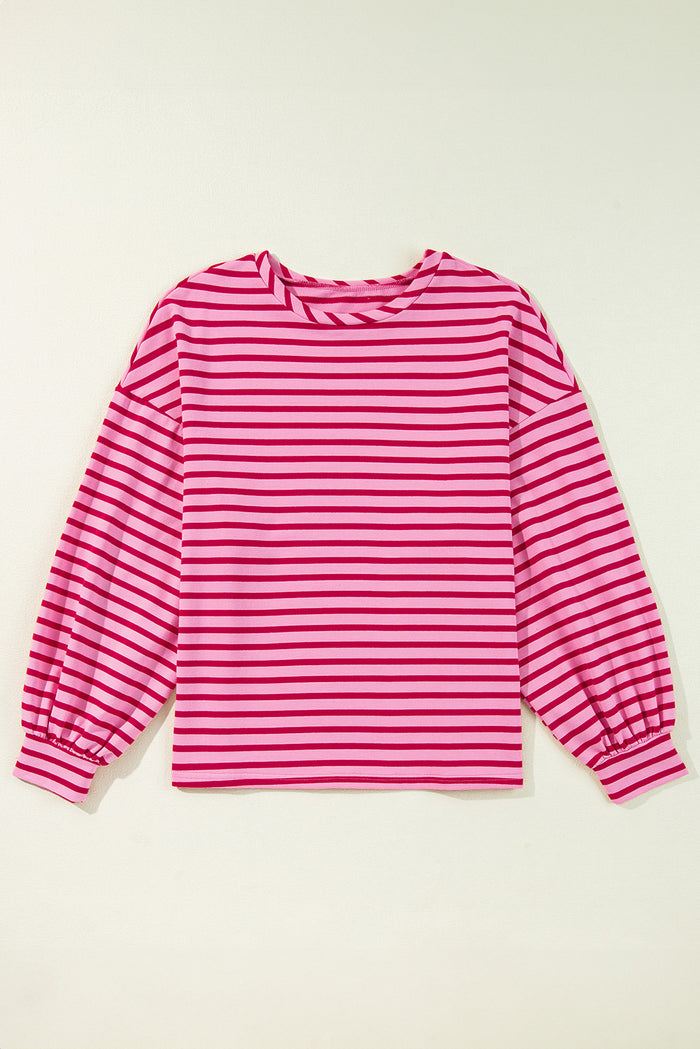 Sweat-shirt rose à rayures et col ras du cou et épaules tombantes