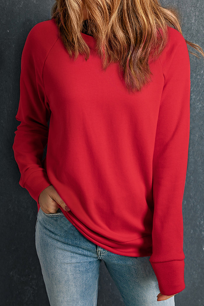 Sweat-shirt rouge uni à col rond et manches raglan