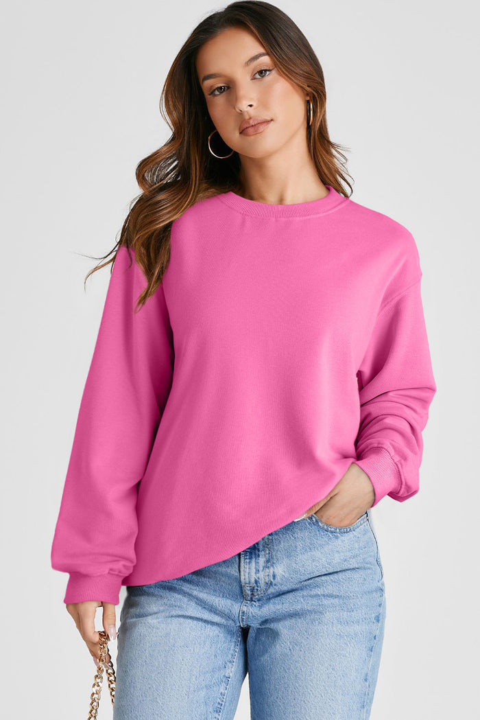 Sweat-shirt uni à col rond et épaules tombantes