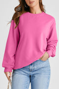 Sweat-shirt uni à col rond et épaules tombantes