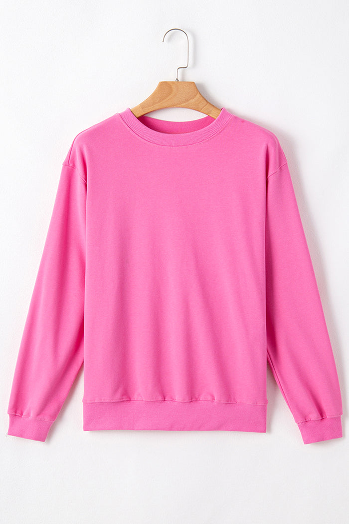 Sweat-shirt uni à col rond et épaules tombantes