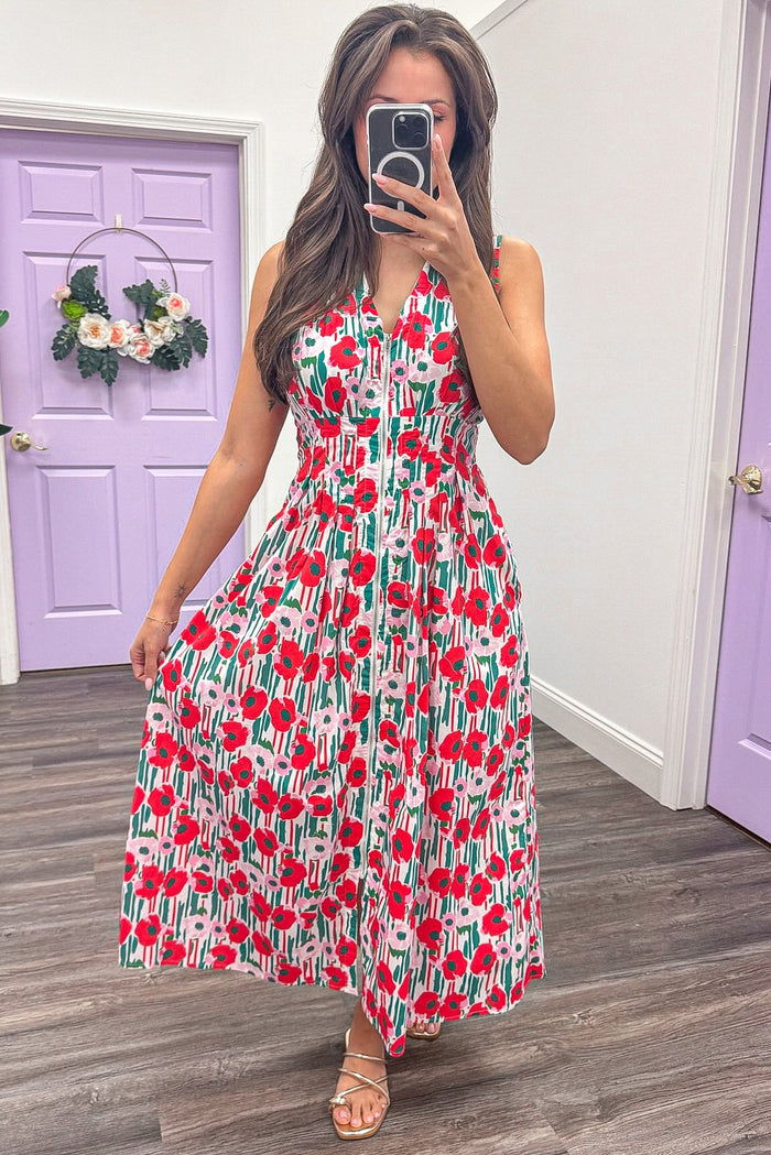 red pink and green floral print sleeveless midi dress with flowy skirt