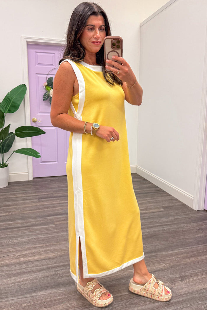 lemon yellow with white trim details sleeveless crew neckline midi dress with hem side slits