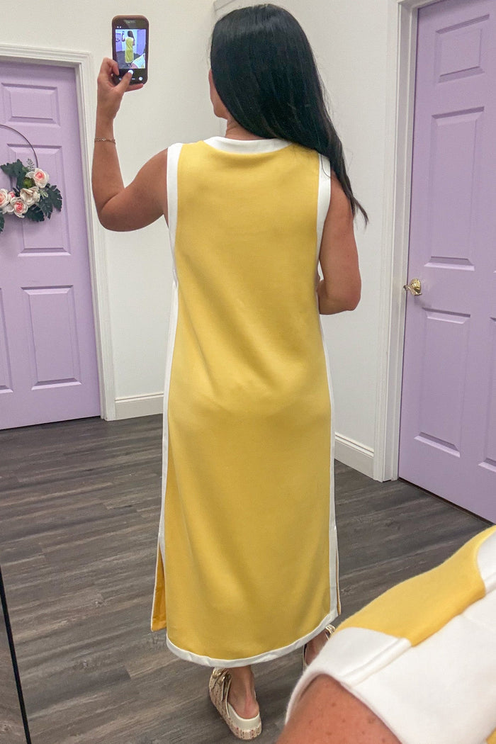 lemon yellow with crisp white trim details sleeveless crew neckline midi dress
