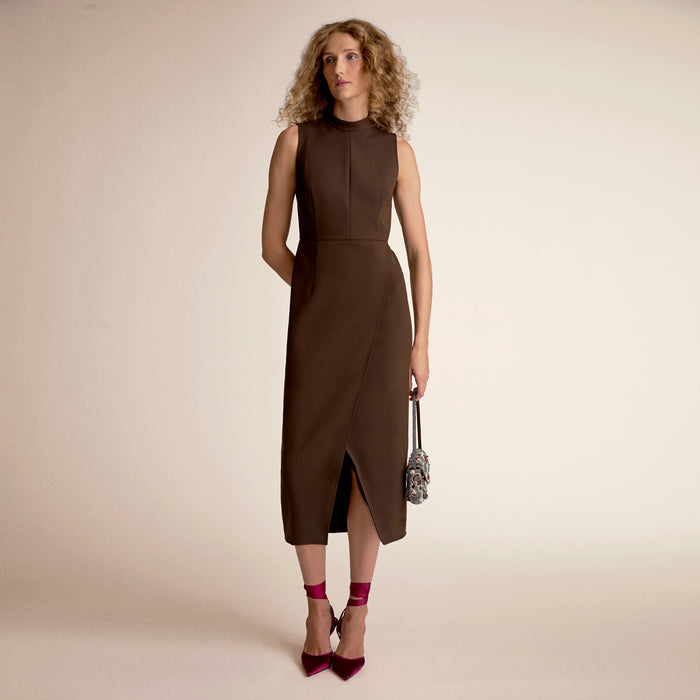 Woman wearing a brown dress | Lead