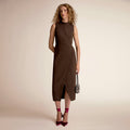 Woman wearing a brown dress | Lead