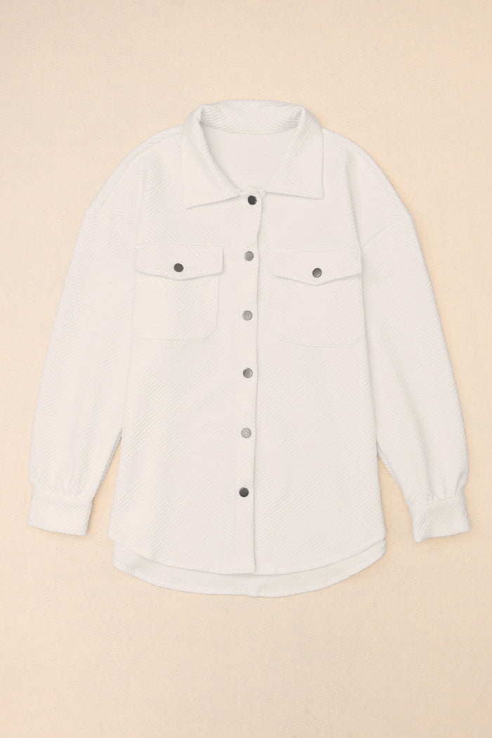 Veste boutonnée à poche à rabat texturée unie