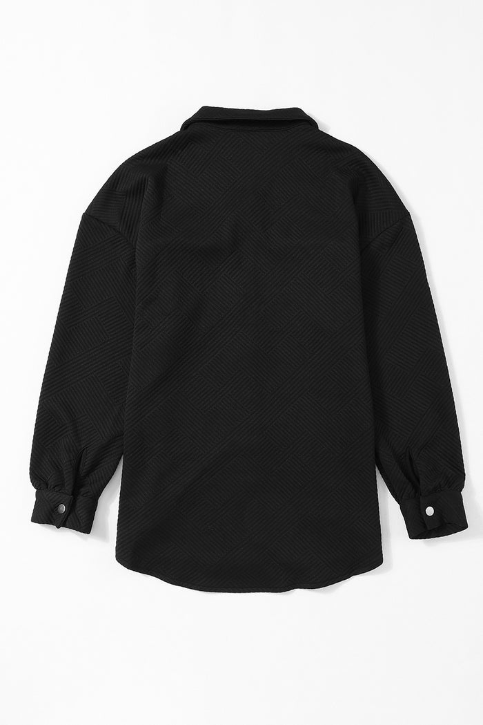 Veste boutonnée noire à poche à rabat texturé uni